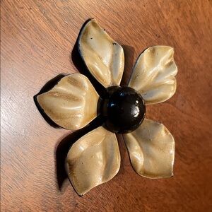 1960s metal brooch with enameled petals, safety pin clasp